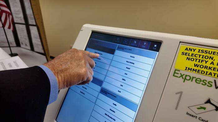 Duval County elections supervisor demonstrates how to use new express vote machines