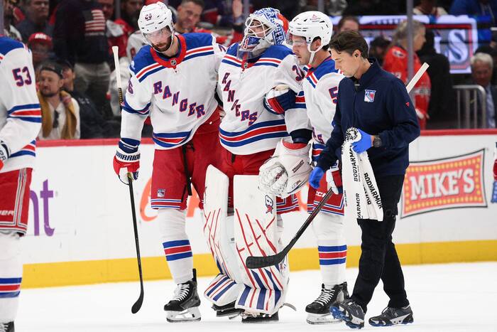 Rangers goalie Igor Shesterkin helped off ice with leg injury after ...