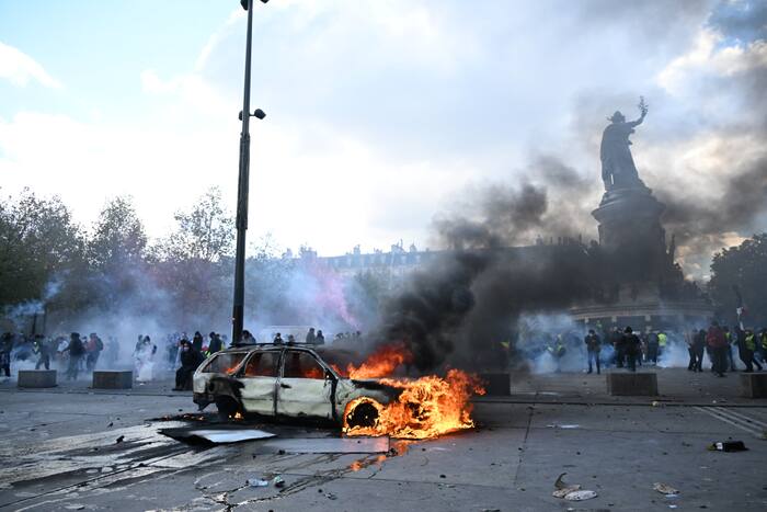 Clashes, fires and looting break out as protesters rally across France ...