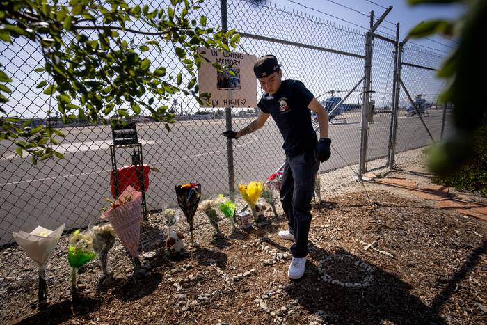 Driver who slammed into LA bus before news helicopter crash charged with murder, prosecutor says