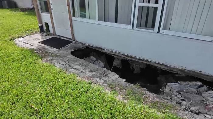 Sinkhole opens beneath Orlando townhome, forcing residents out