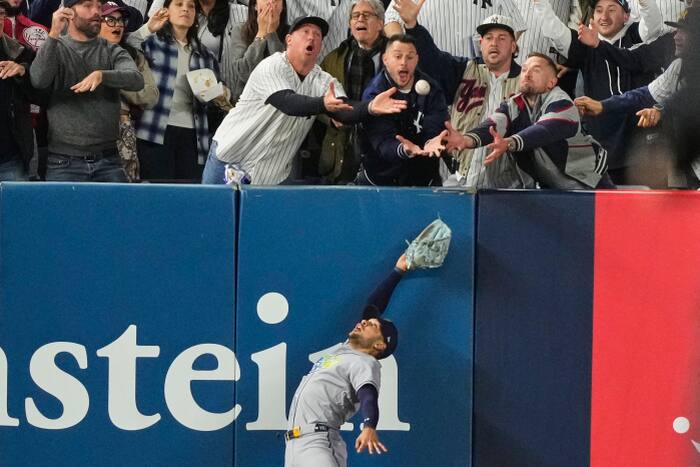 Fan interference costs Volpe tying home run in Yankees-Rays playoff game