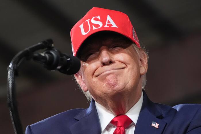 Democrats flood midterm ads with Trump attacks as he seeks ballot focus