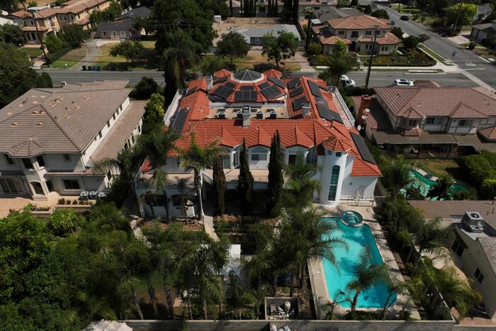 California couple arrested over child abuse in surrogacy investigation