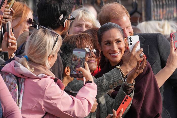 Prince Harry and Meghan cheered as they make first joint appearances since returning to UK