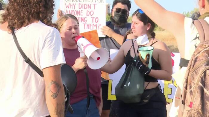 Protesters rally outside ICE Processing Center in Pearsall