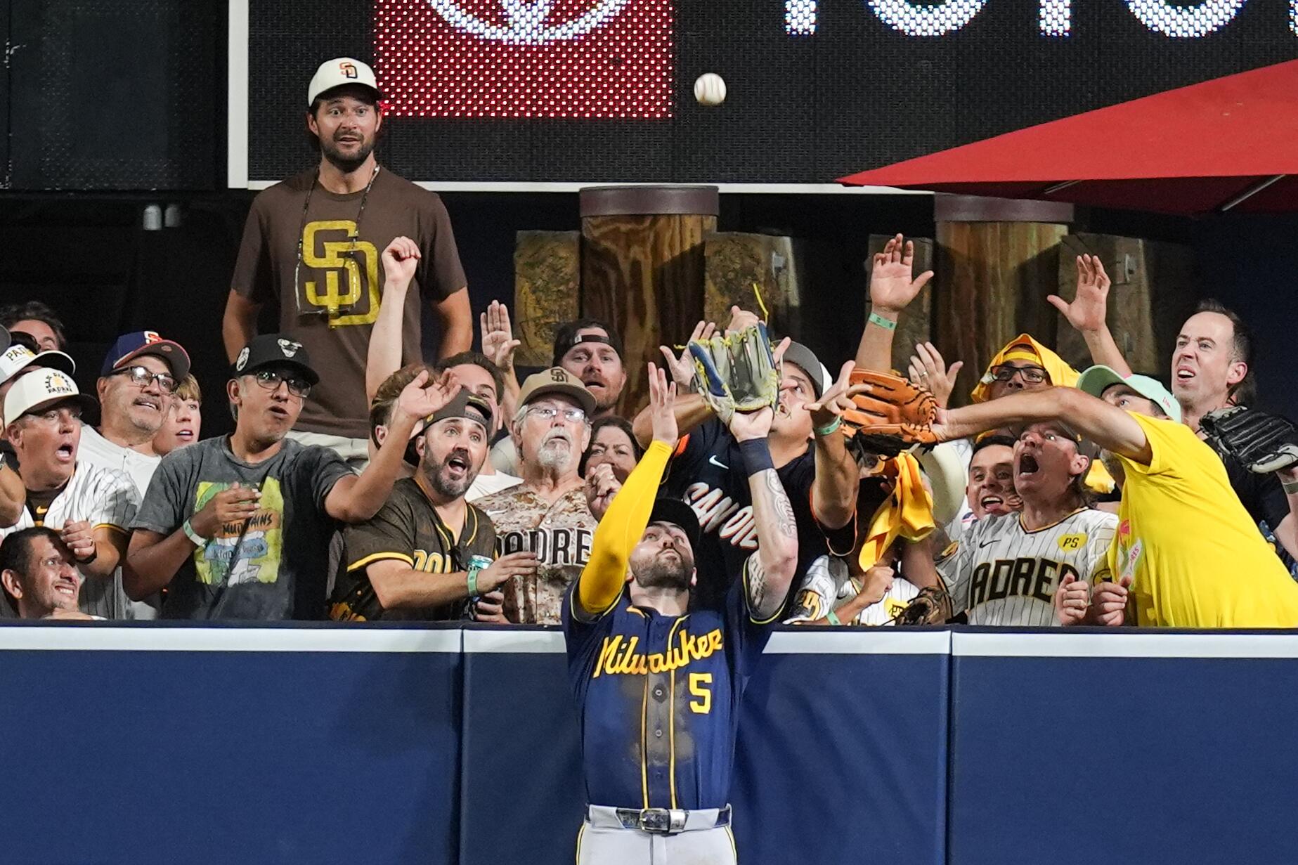 Garrett Mitchell number 5 making the catch at the Petco Park center field wall in Brewers Padres NLDS Game 4 October 7 2026