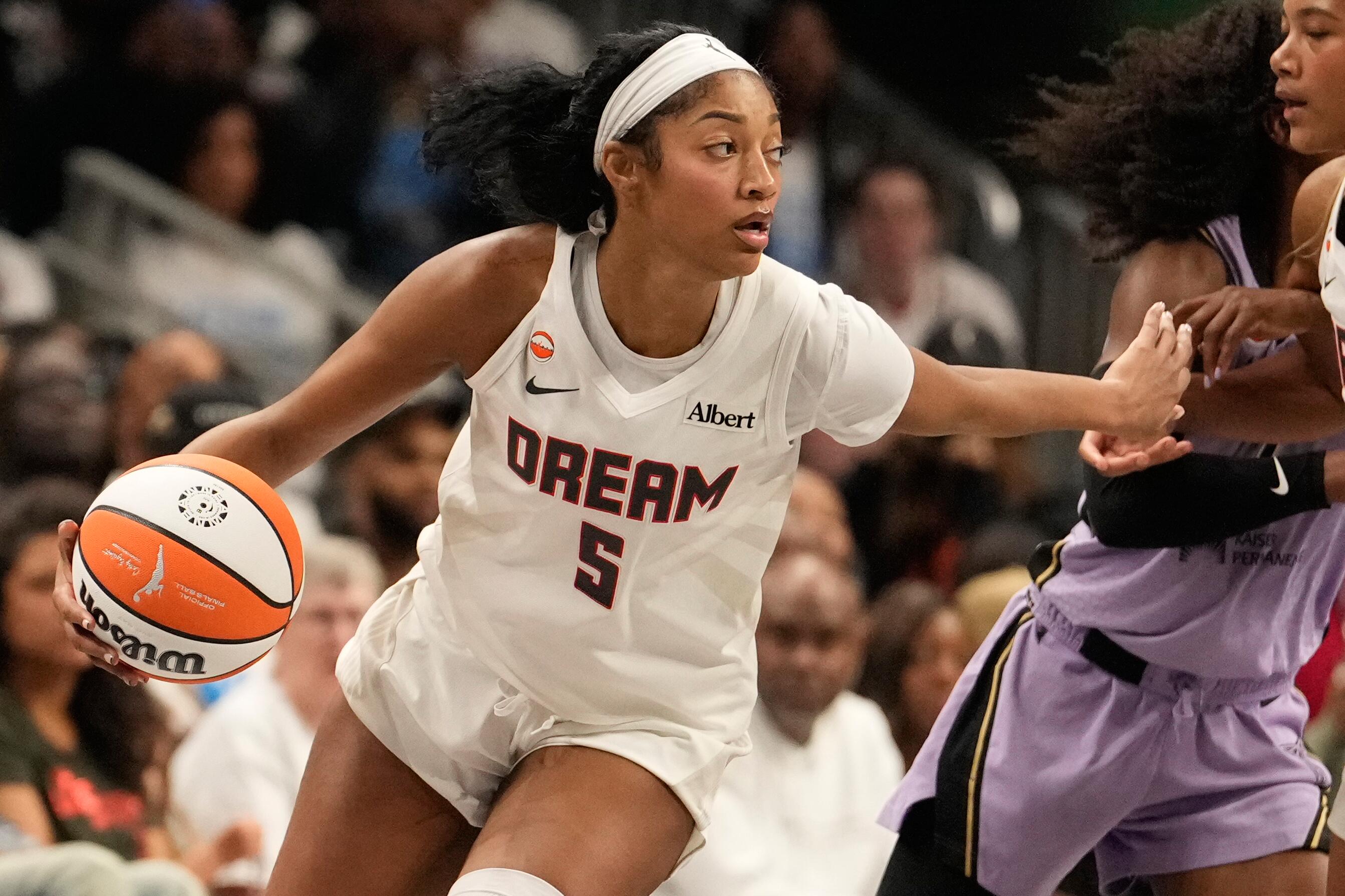 Angel Reese handles the ball for Atlanta Dream during Game 4 of the 2026 WNBA Finals