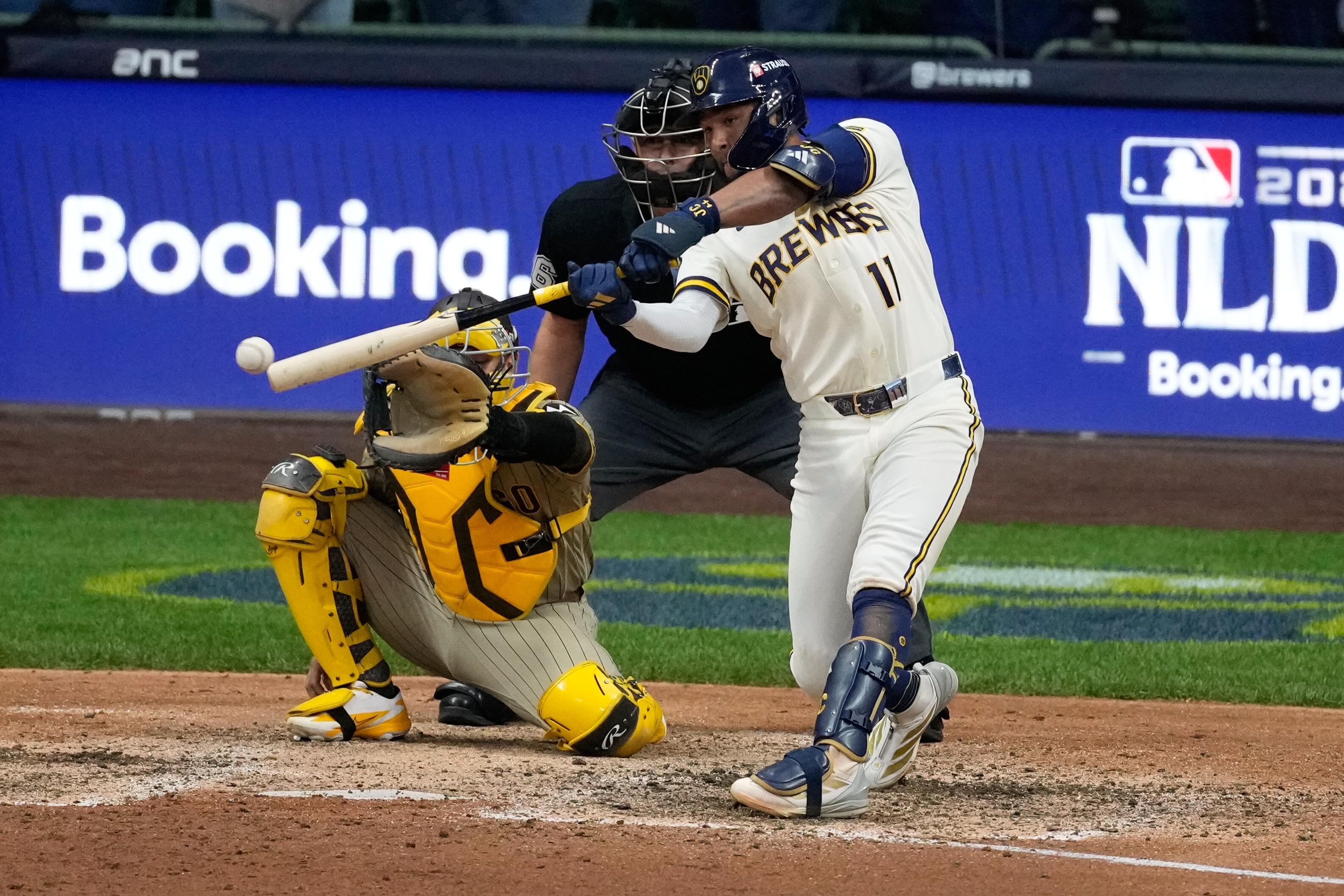 Jackson Chourio makes contact during his decisive two-run walk-off single against the Padres in 2026 NLDS Game 2