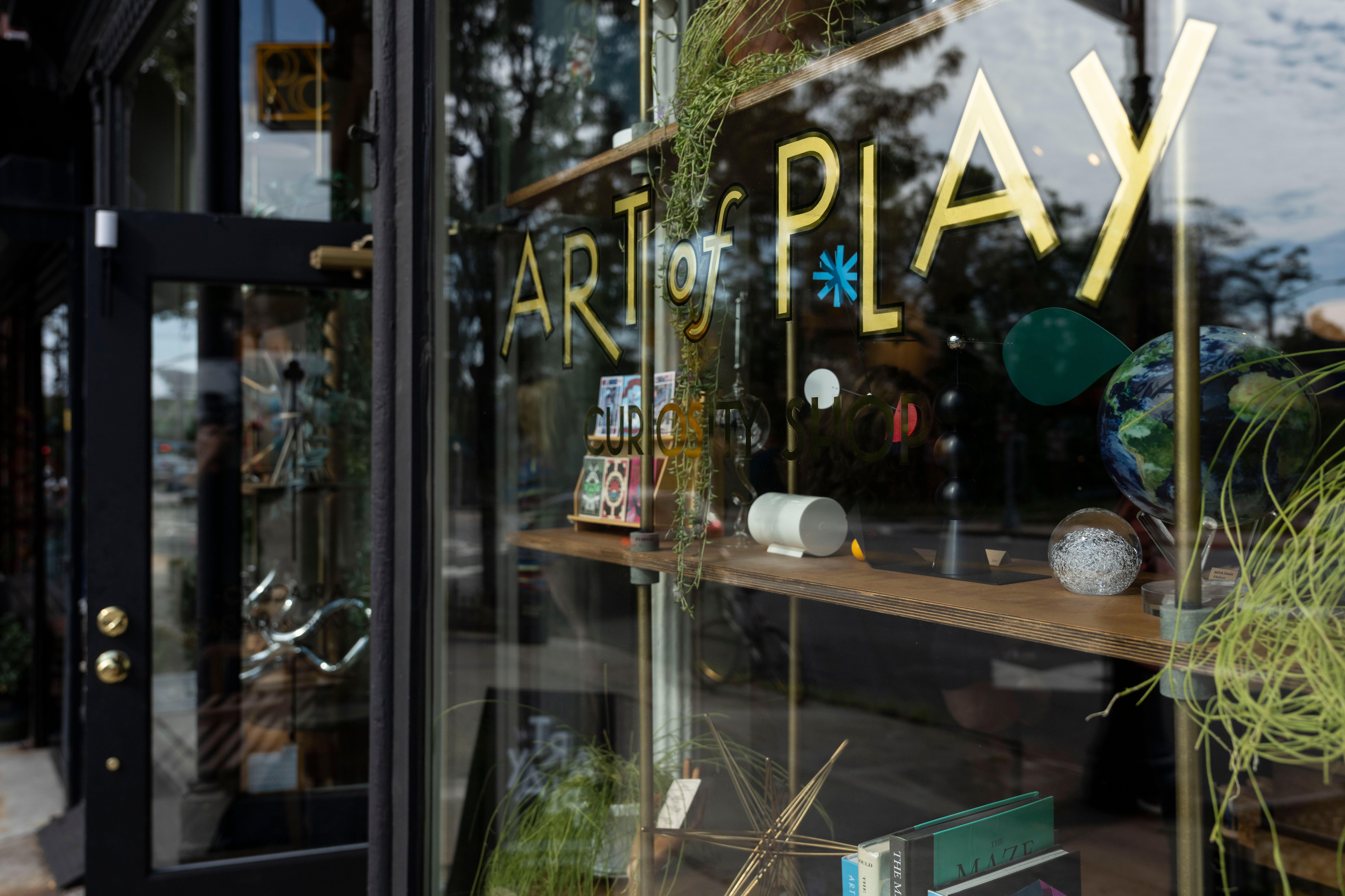 Art of Play shop window and signage in Brooklyn