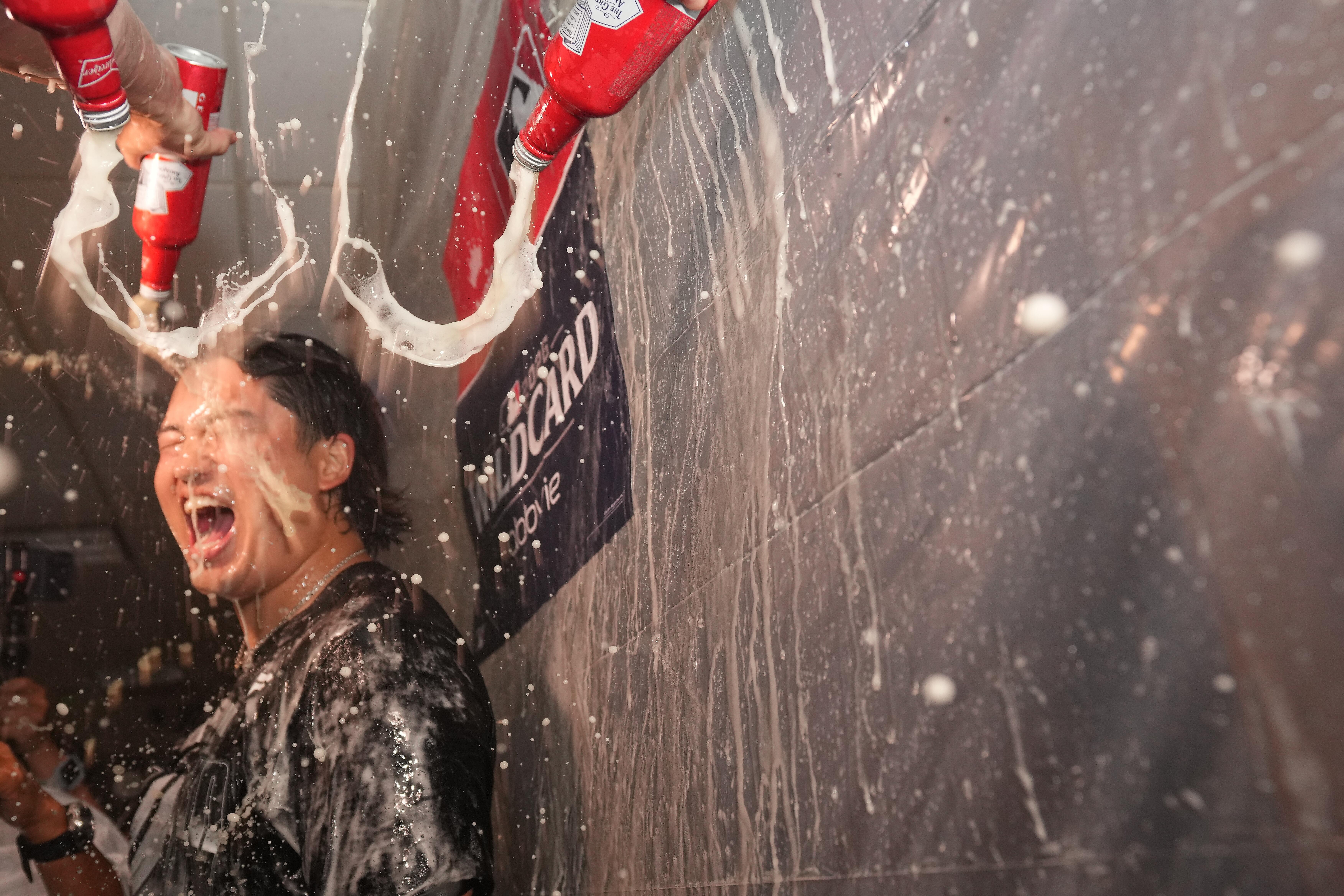 Munetaka Murakami covered in champagne after Chicago White Sox Wild Card series victory
