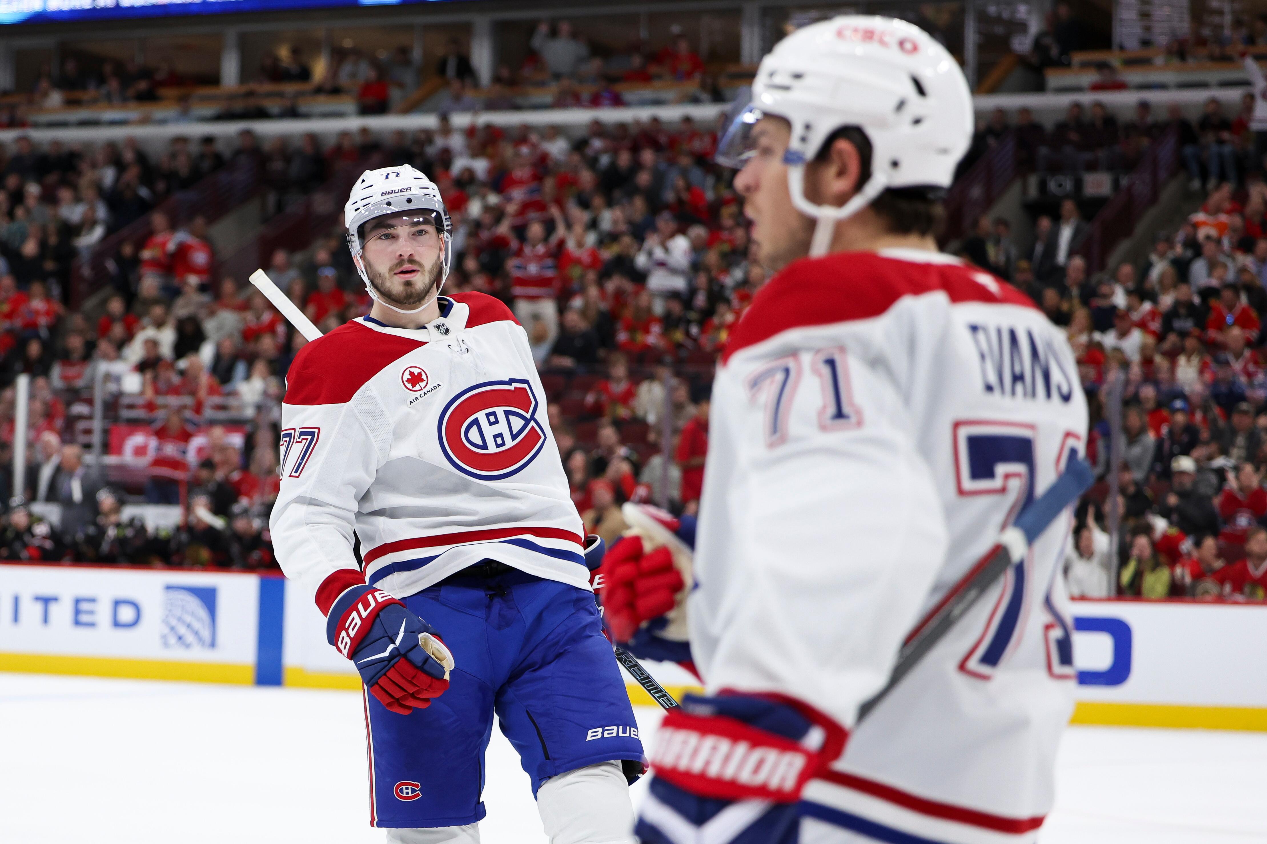 Kirby Dach celebrating with Jake Evans after a Montreal goal against Chicago on October 23, 2026