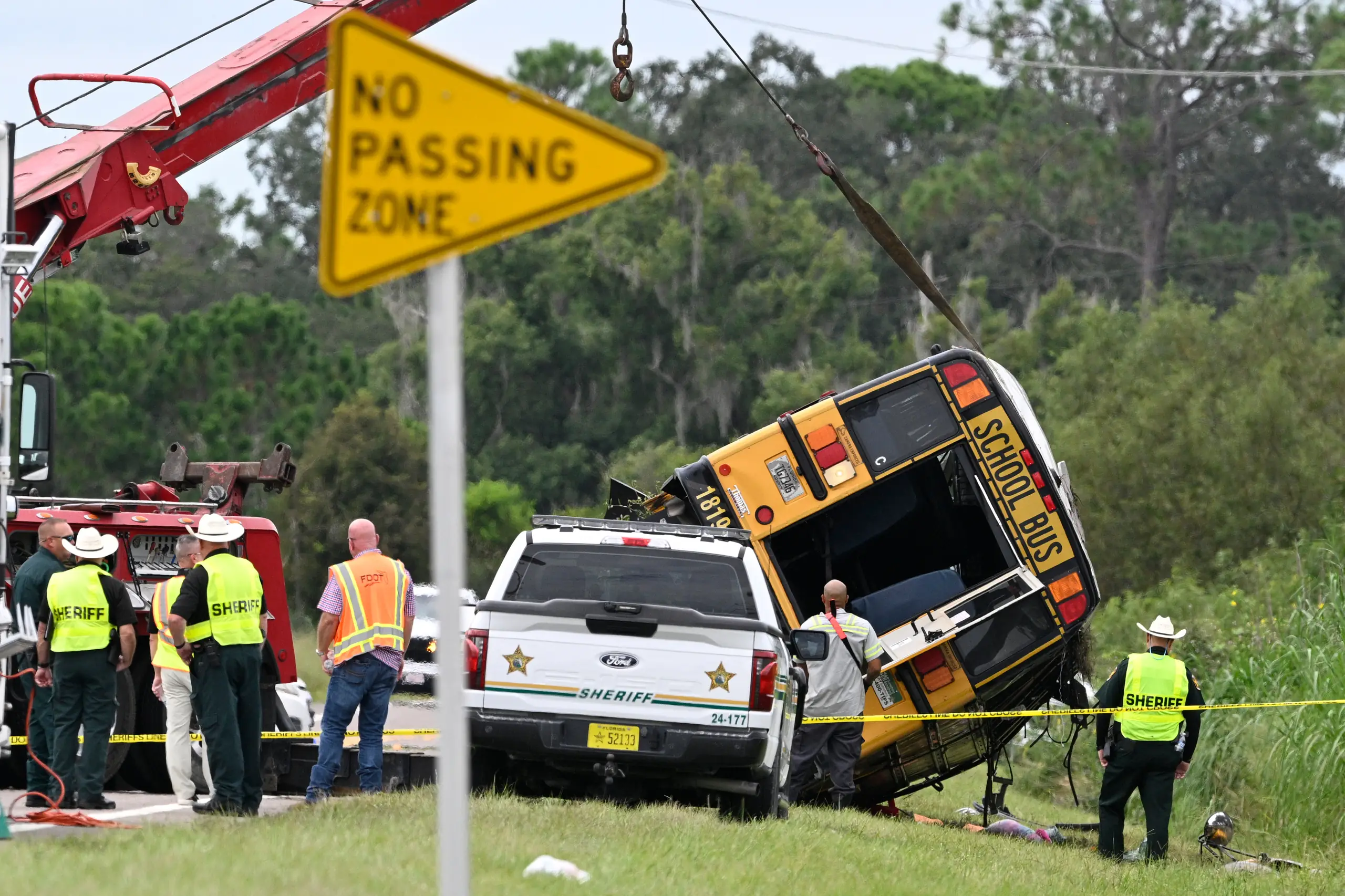 2 people killed, including a student, after Florida school bus rolls ...