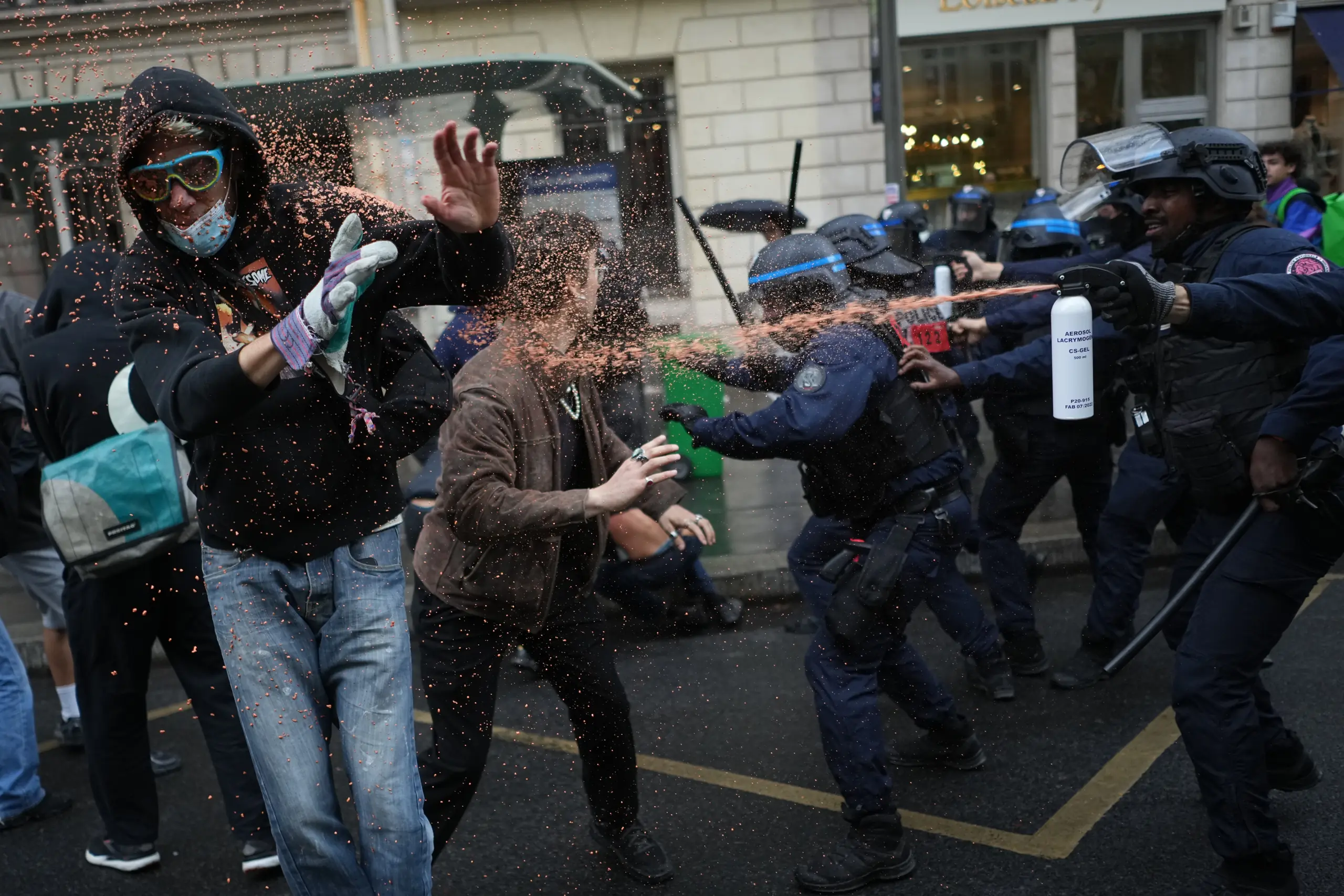 Protesters No Signs Police fire tear gas at barricaded Paris high school as student ...