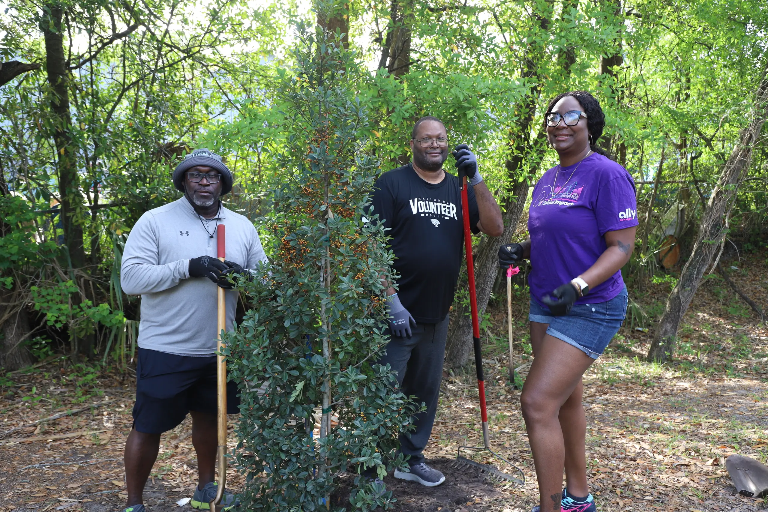 Volunteers plant 60 trees along Emerald Trail S-Line to add beauty, shade