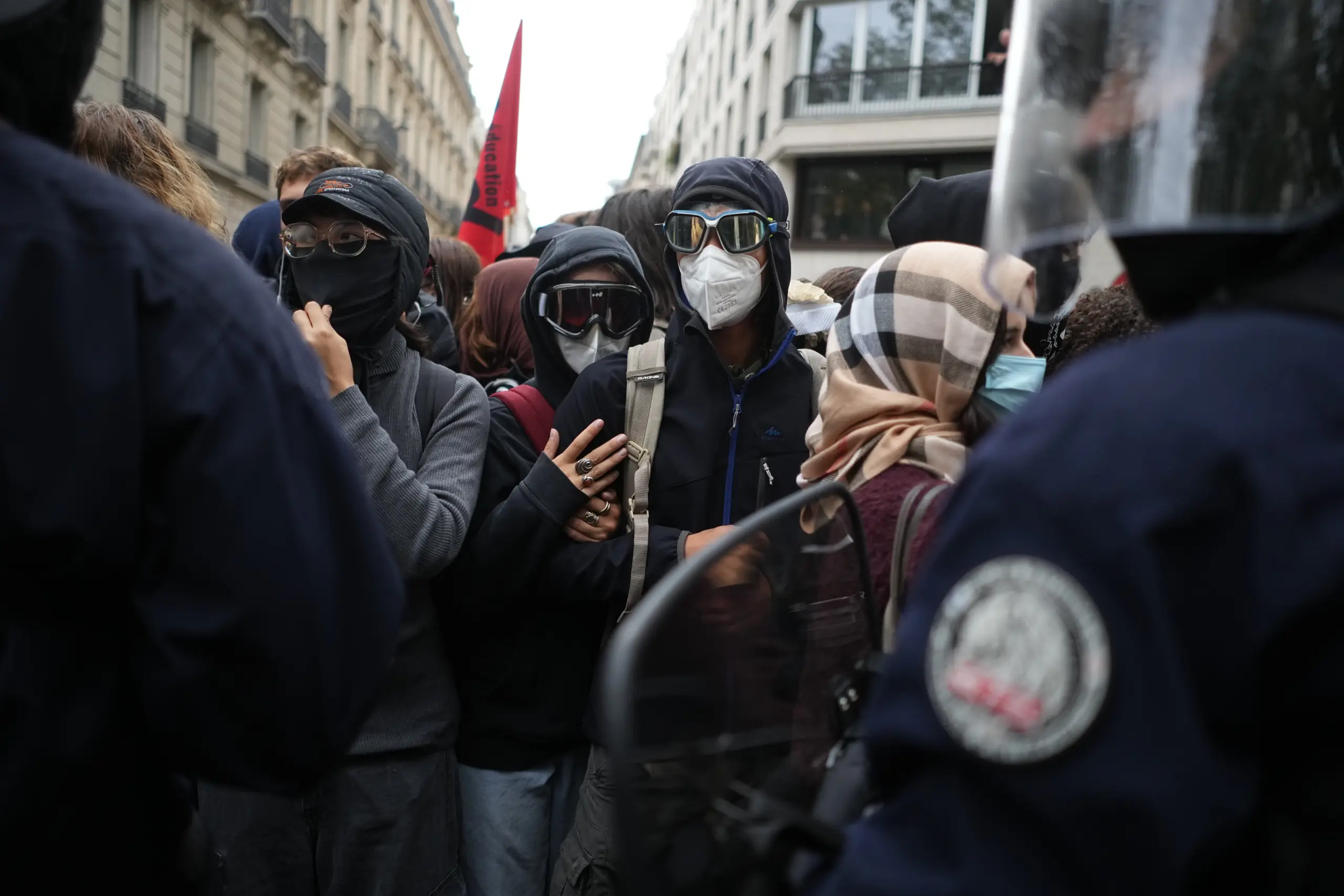 Protesters No Signs Police fire tear gas at barricaded Paris high school as student ...
