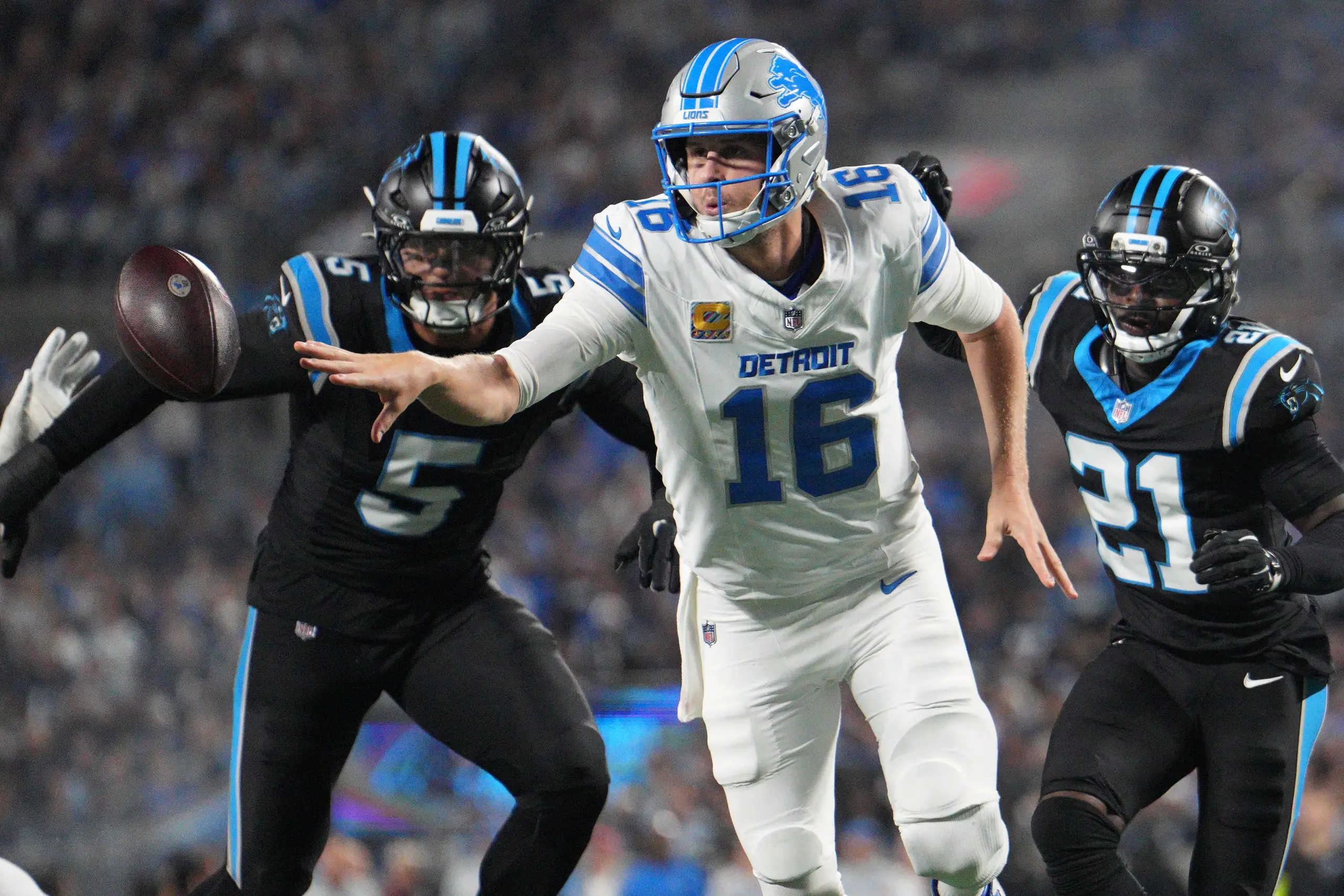 Young, McMillan connect for 2 TDs to lead Panthers past Lions 32-26
