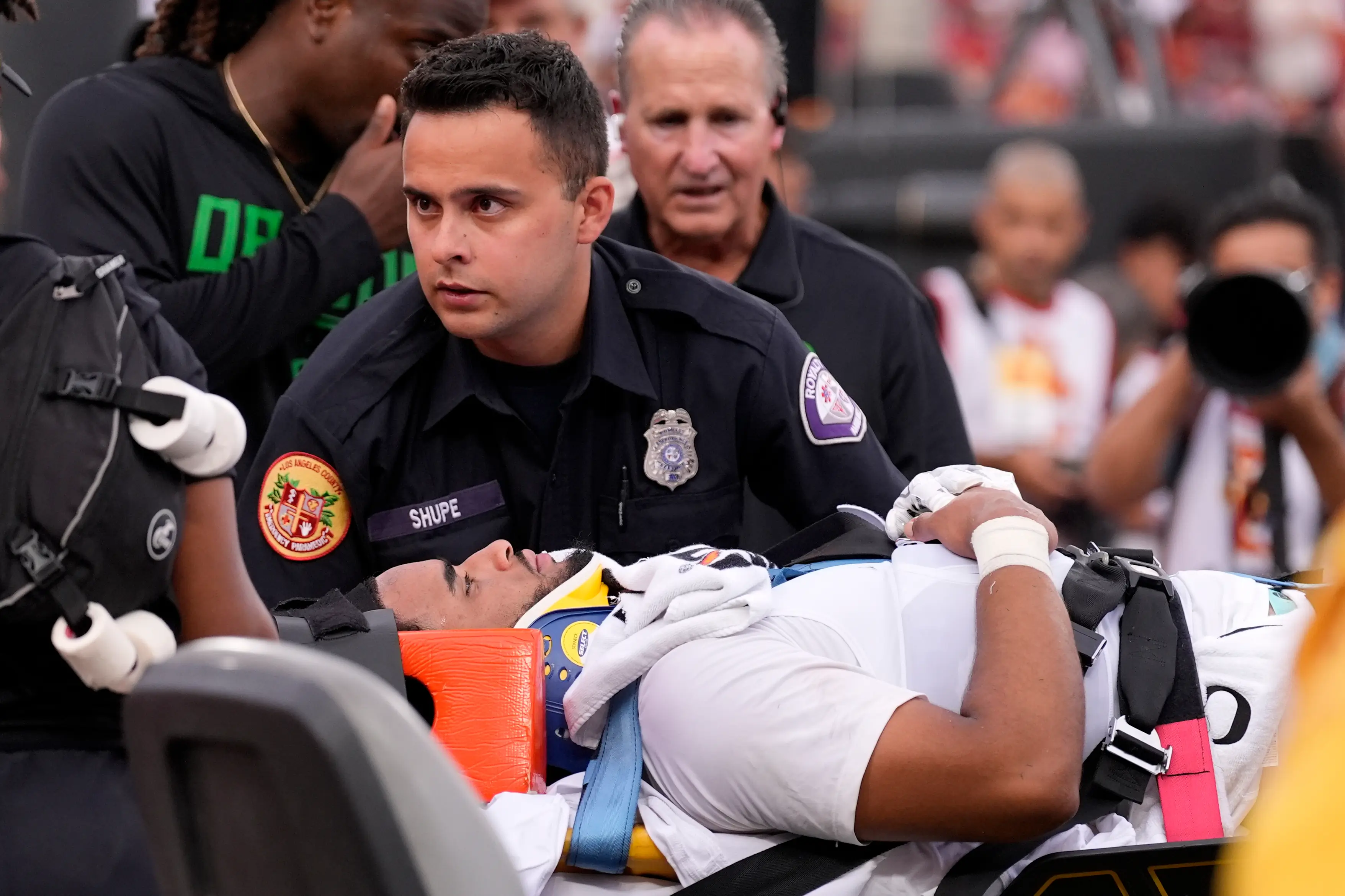 Oregon QB Dante Moore leaves field in ambulance after late hit. His Ducks rally for a stirring win