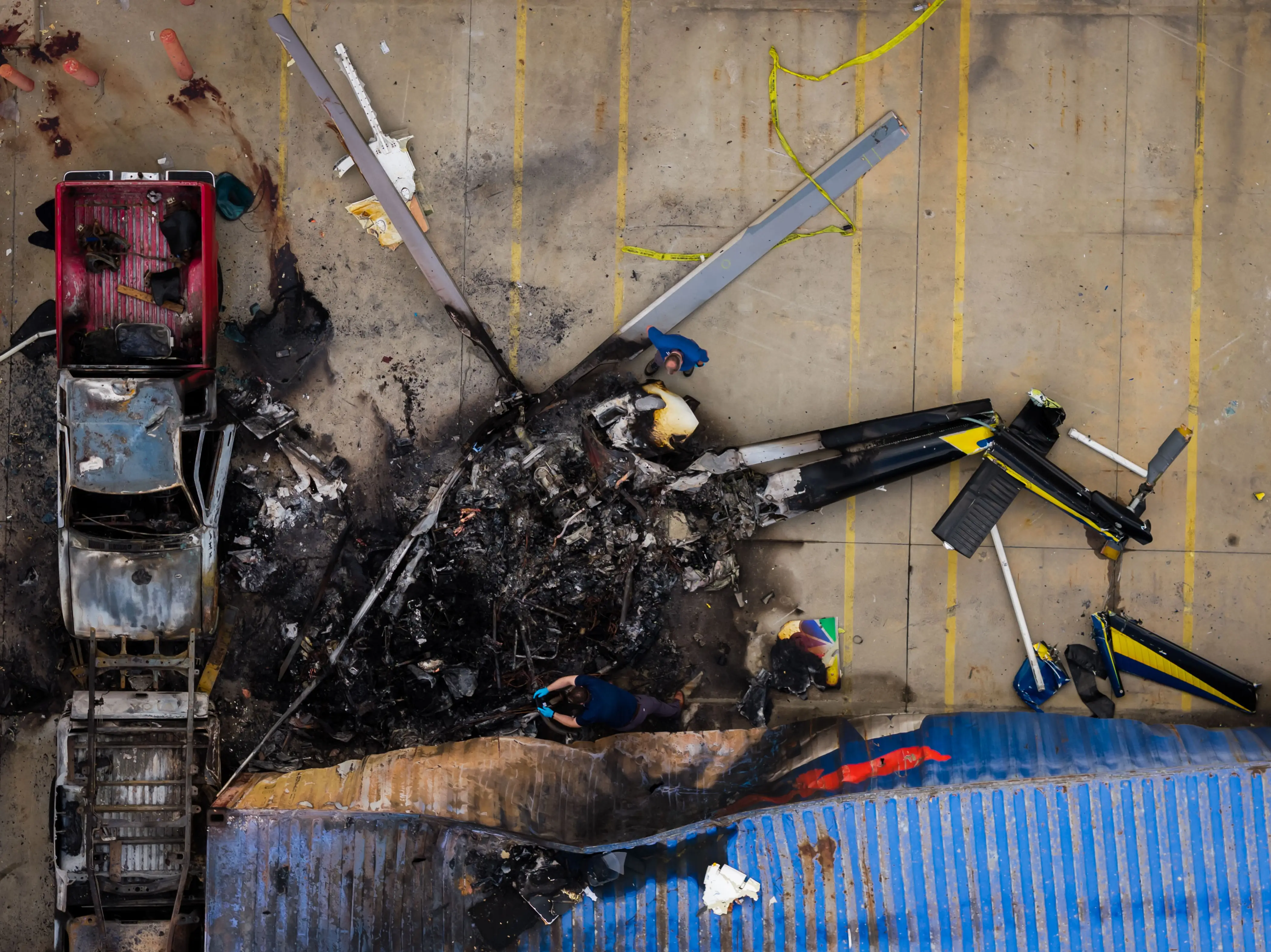 Driver who slammed into LA bus before news helicopter crash charged with murder, prosecutor says