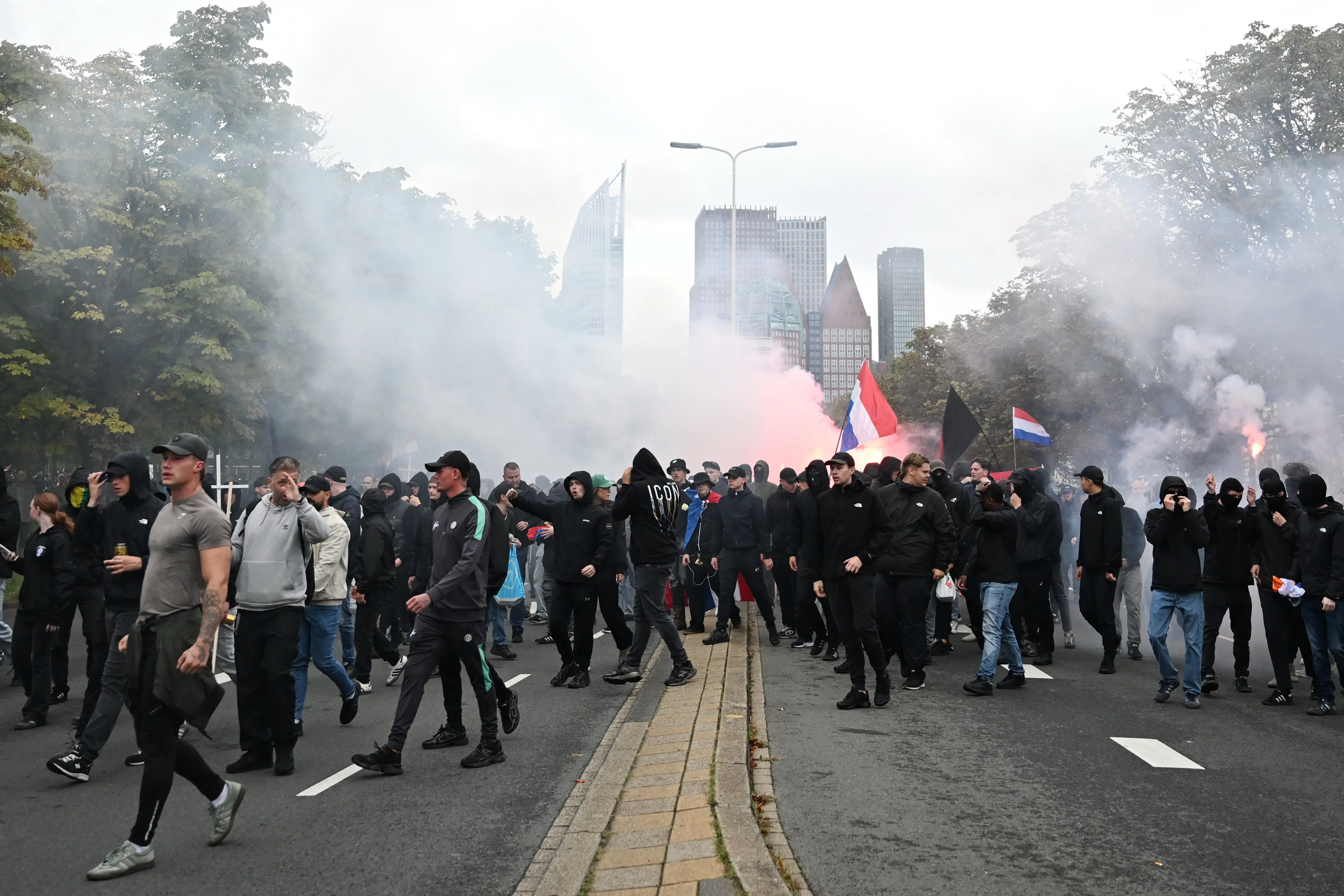 Dutch riot police break up far-right protest in The Hague after violence erupts