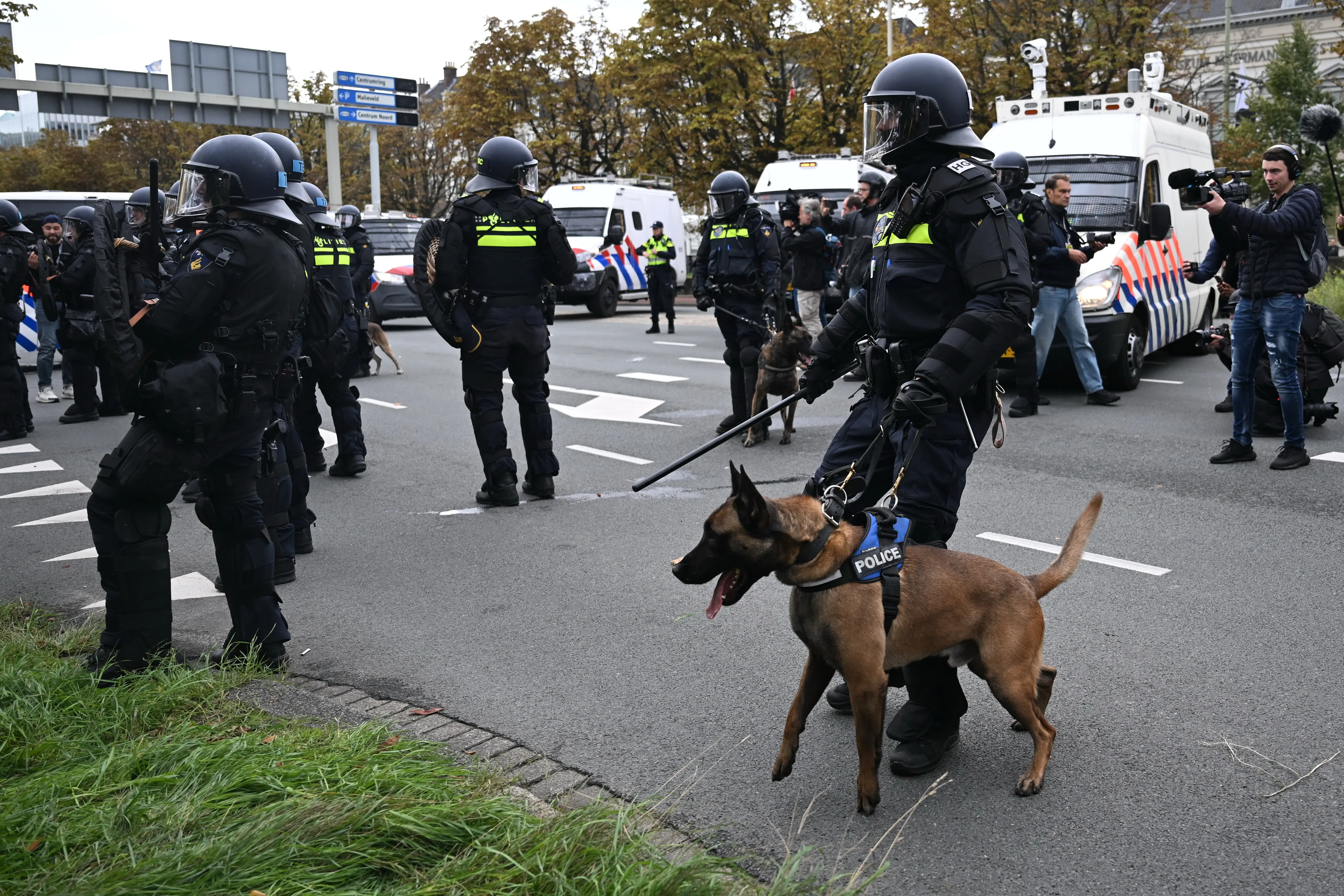 Dutch riot police break up far-right protest in The Hague after violence erupts