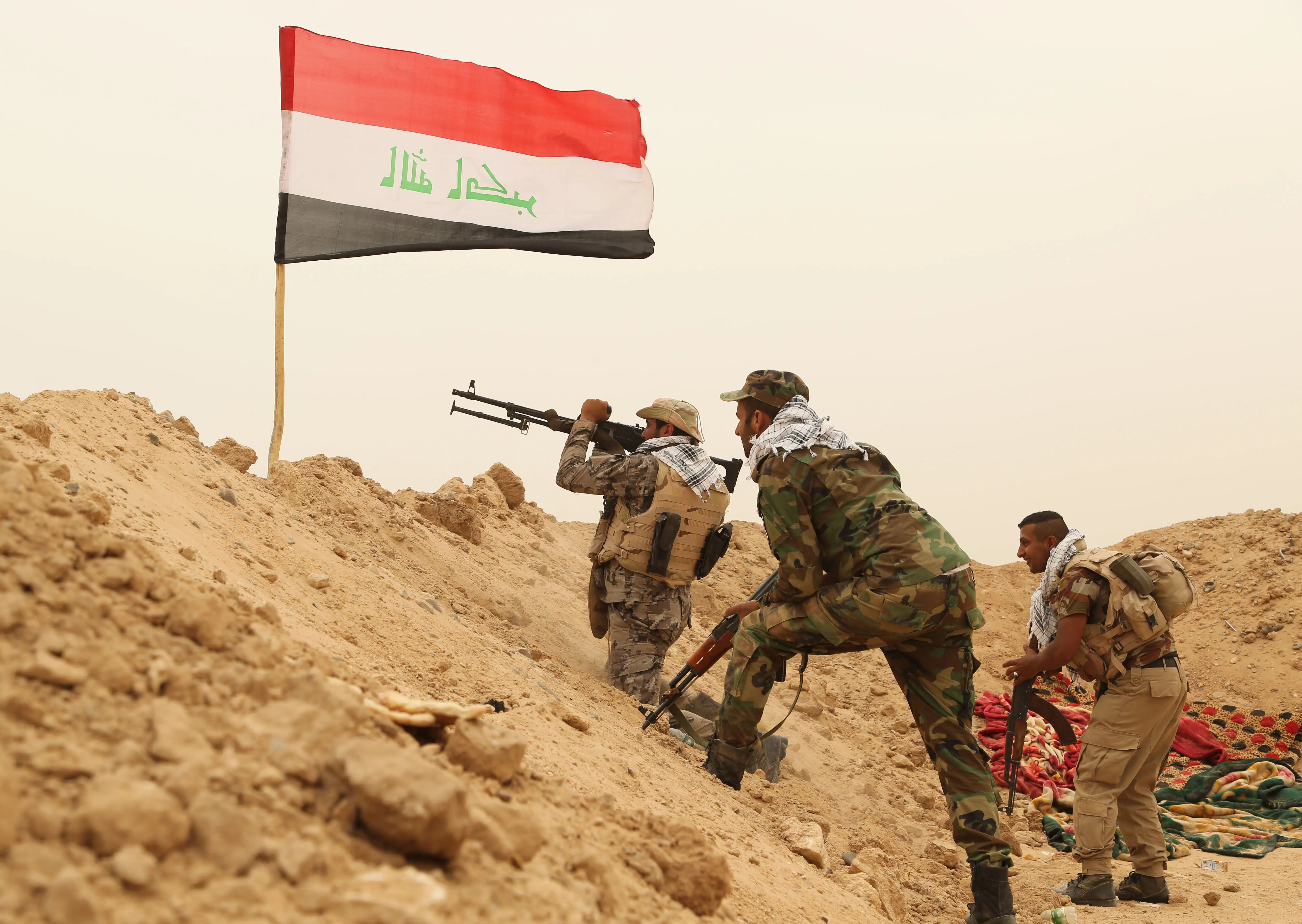 As the last US troops exit Iraq, Kurdish fears rise and militias celebrate