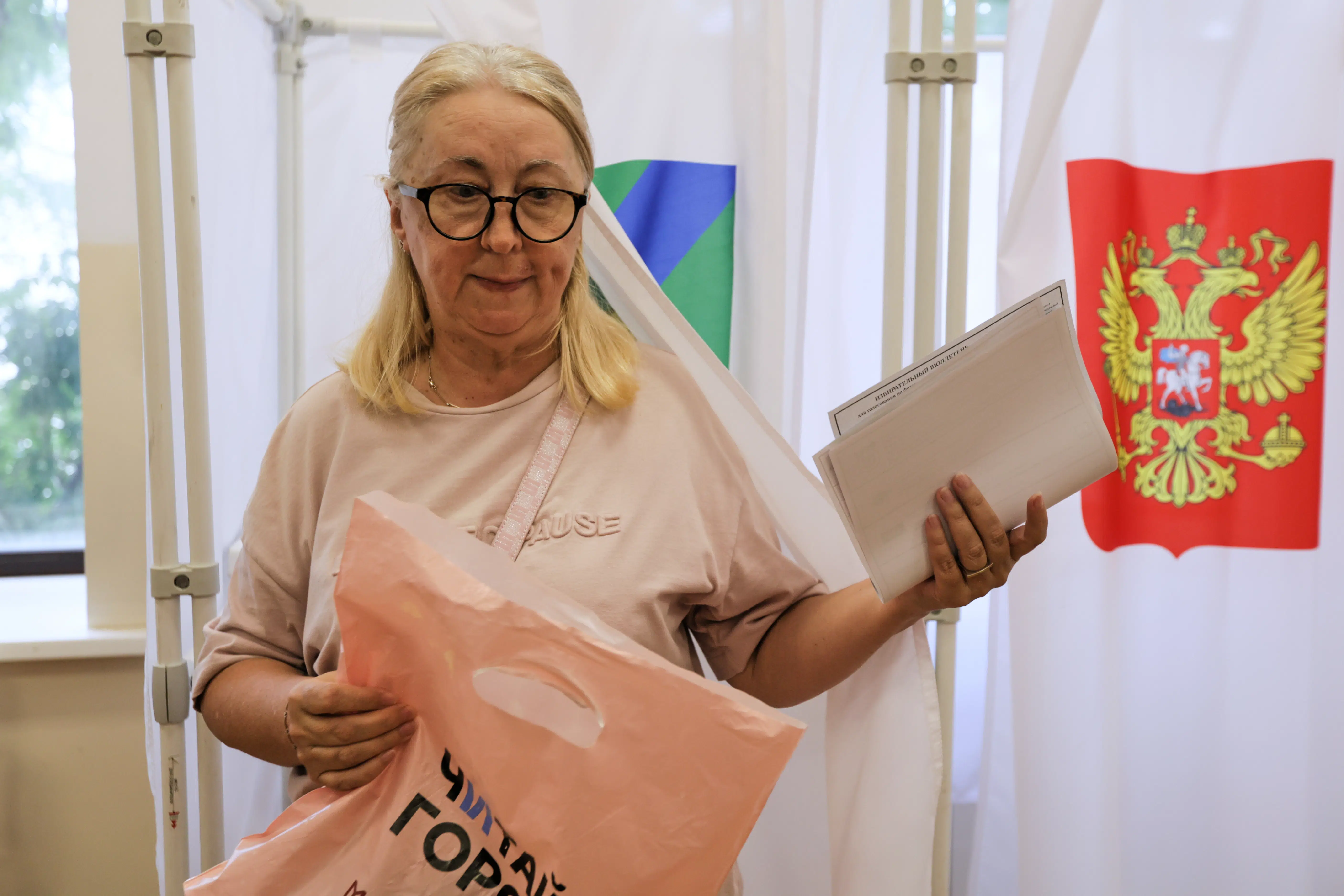 Russians begin 3 days of voting in a parliamentary election set to cement the Kremlin's power