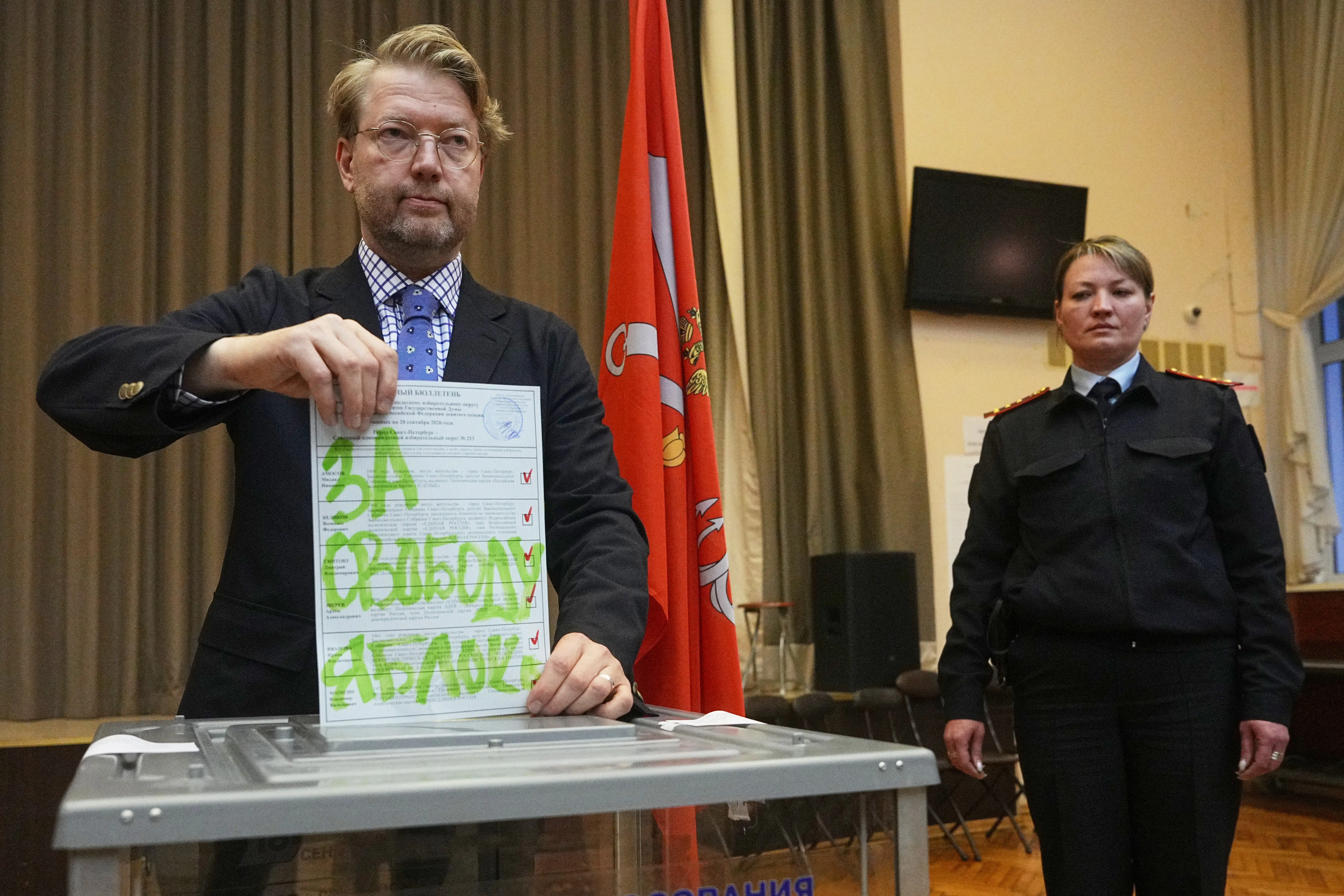 Russia wraps up first wartime parliamentary election with Kremlin dominance all but assured