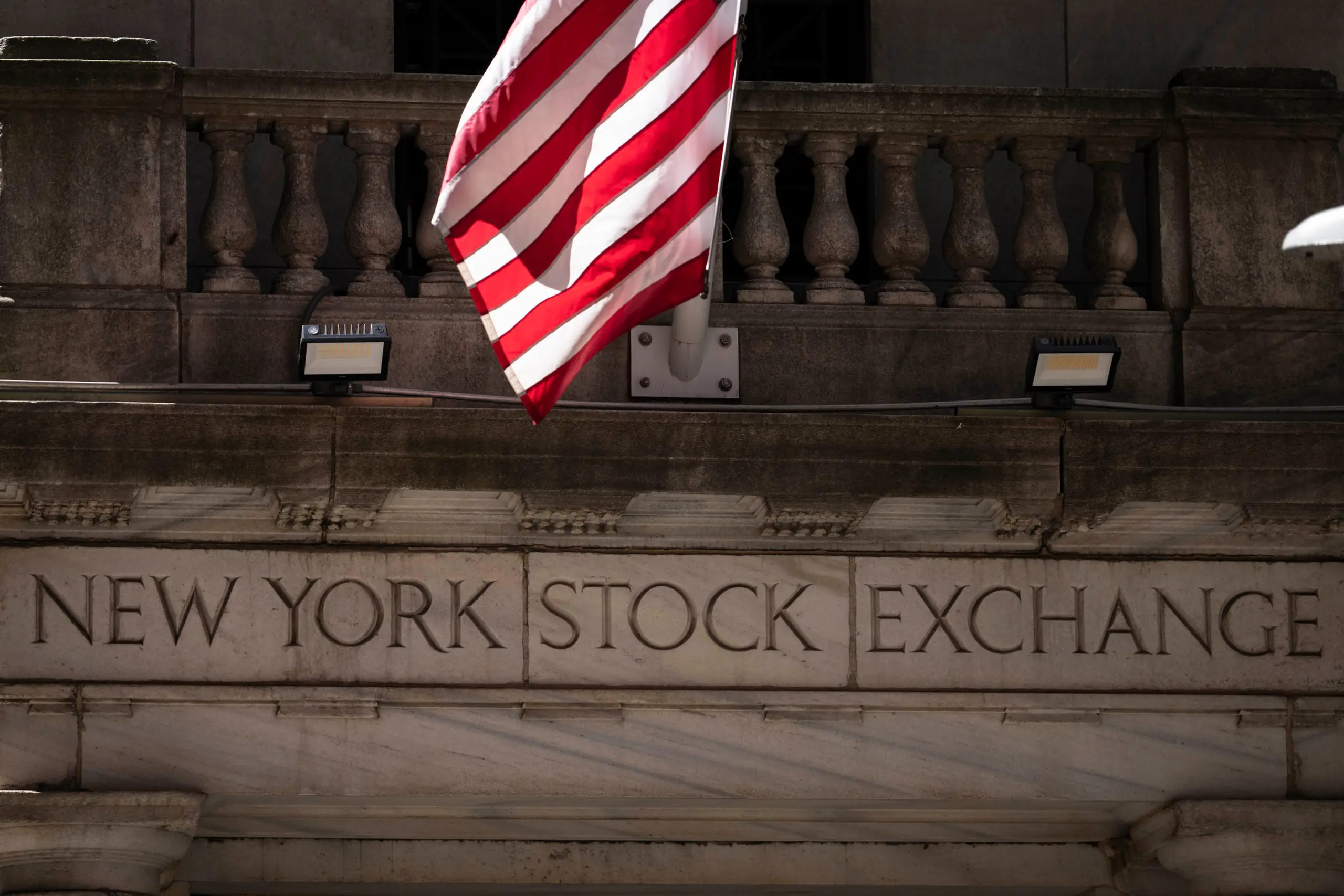Key Document Icon Wall Street retreats from its record as stocks fall worldwide