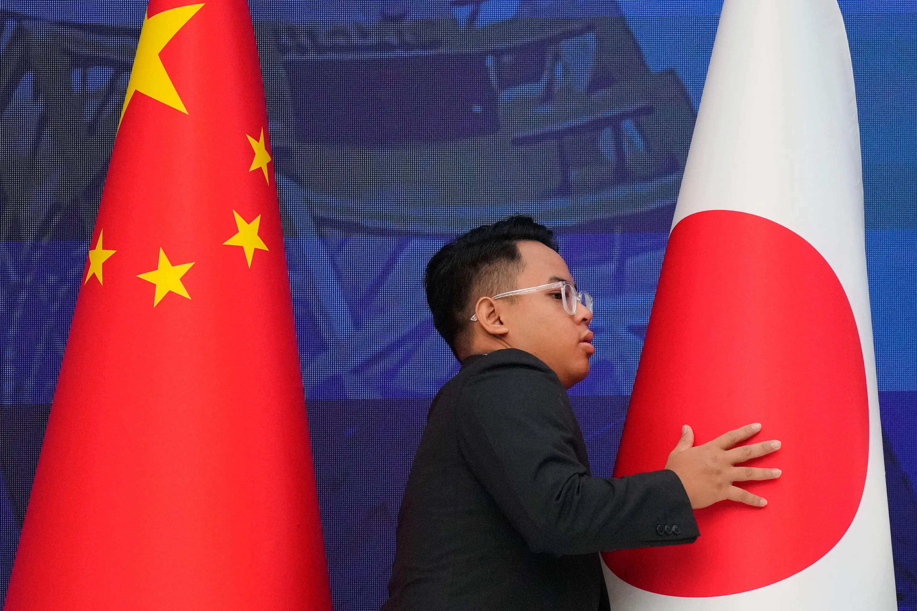 Filing Key Japan protests as China slaps new measures against its exports of a key ...