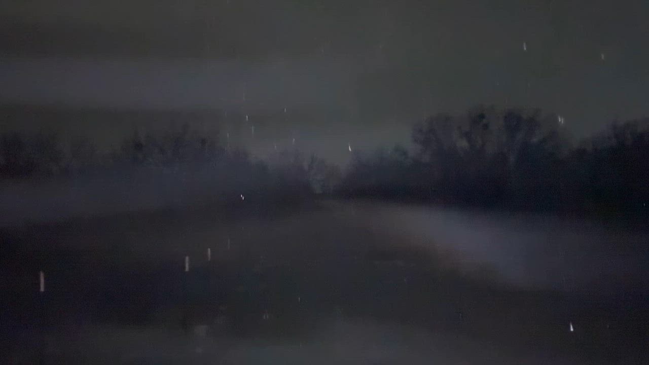 Rain falling sideways and hard. Thunder and lightening. 