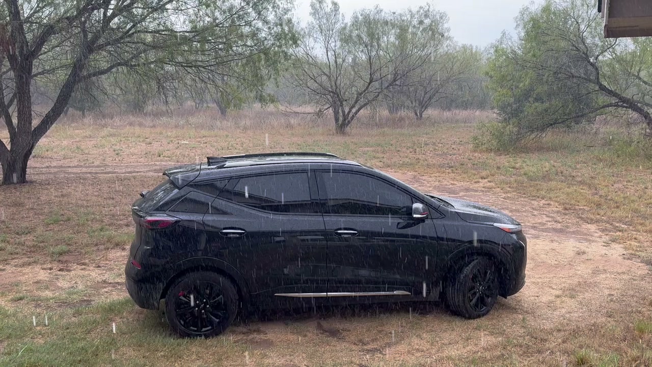 Raining. Our Vder got a good rinse off from all this dusty Sandy loam. 